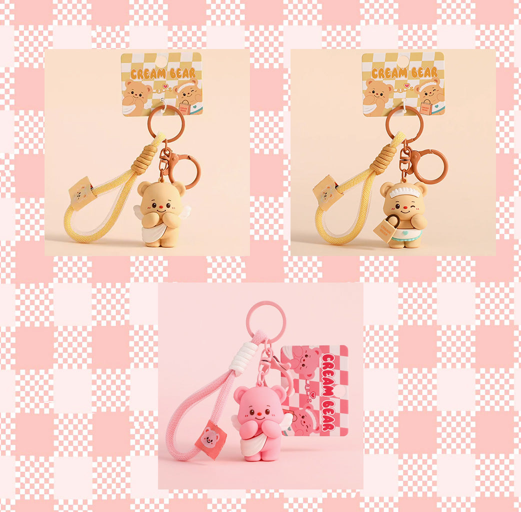 It is a charming and versatile accessory featuring an adorable bear character in soft, creamy colors.