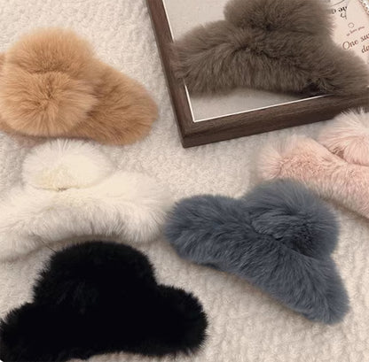 Add a touch of luxury and comfort to your hair styling with the Faux Fur Plush Large Hair Claw Clip.